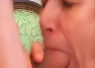 Mom is on her knees to deepthroat son's cock